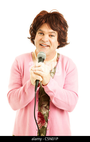 Cross dressing celebrity impersonator effectue une chanson. Isolé sur blanc. Banque D'Images