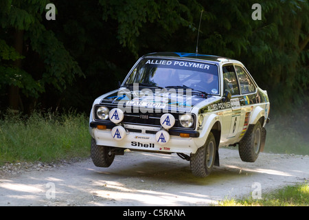 Bjorn Waldegard 1975 ex du RAC rally gagner Ford Escort MK2 RS1800 avec chauffeur David Watkins. 2011 Goodwood Festival of Speed. Banque D'Images