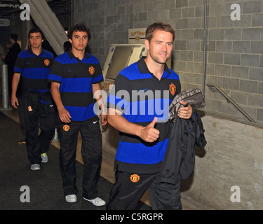 Les joueurs de Manchester United (l-r) Rafael da Silva, Fabio Da Silva et Michael Owen quitter le vestiaire à Chicago. Banque D'Images