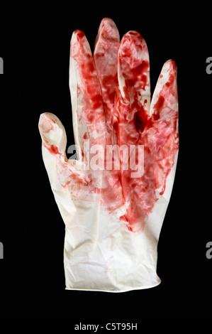 Close-up of blood stained sur glove Banque D'Images