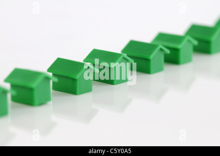 Rangée de maisons modèles vert Banque D'Images