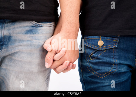 Jeune couple mains, isolé sur fond blanc Banque D'Images