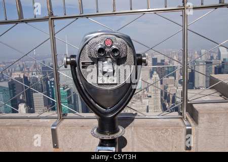 Télescope au-dessus de l'Empire State Building à New York Banque D'Images