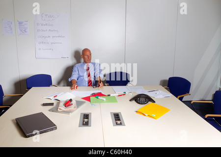 Businessman sitting at conference 24 Banque D'Images