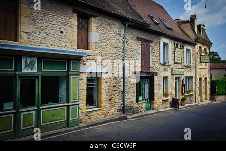 Un restaurant dans le village de Siorac-en-Périgord, France Banque D'Images