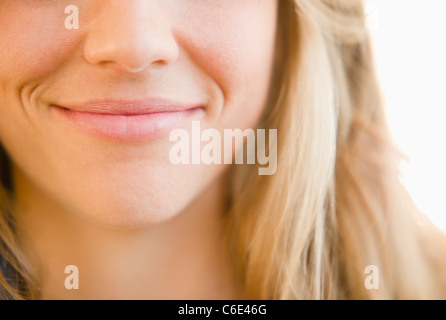 USA, New Jersey, Jersey City, Close up de bouche de femme souriant Banque D'Images