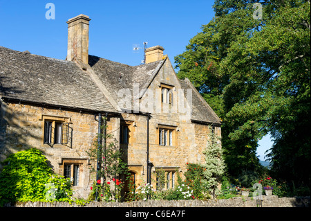 Cotswold attrayant cottages en pierre dans le joli village de Stanton, Worcestershire, Angleterre. Banque D'Images