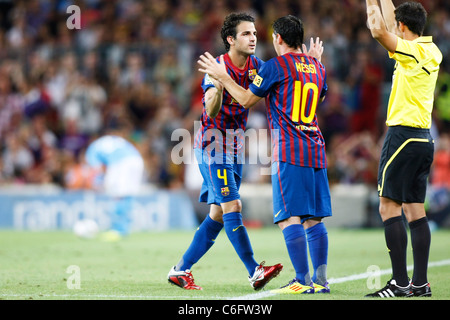 Cesc Fabregas et Lionel Messi (Barcelone) jouant pour Trofeo Joan Gamper match entre FC Barcelona 5-0 Napoli. Banque D'Images