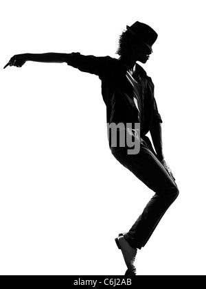 Longueur totale silhouette d'un jeune homme danseur hip hop funky r&b sur studio isolé sur fond blanc Banque D'Images