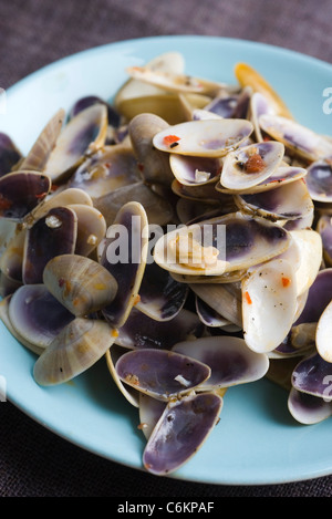 Tellina clams avec de la chaux et de pâte de piment Banque D'Images