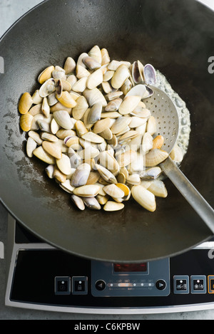 Tellina clams avec de la chaux et de pâte de piment Banque D'Images