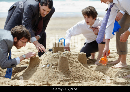 Château de sable de construction d'affaires Banque D'Images