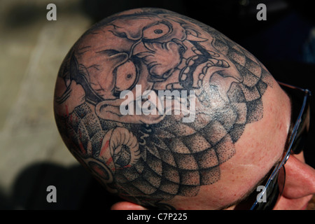 La gravure de Tatouage et perçage du corps lors d'un festival à Londres, Royaume-Uni Banque D'Images