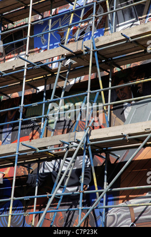 Restauration de fresque dans la rue de Londres,Câble,marquage bataille entre Oswald Mosley's Union britannique des fascistes et des habitants en 1936 Banque D'Images