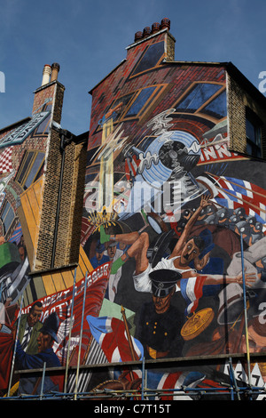 Restauration de fresque dans la rue de Londres,Câble,marquage bataille entre Oswald Mosley's Union britannique des fascistes et des habitants en 1936 Banque D'Images