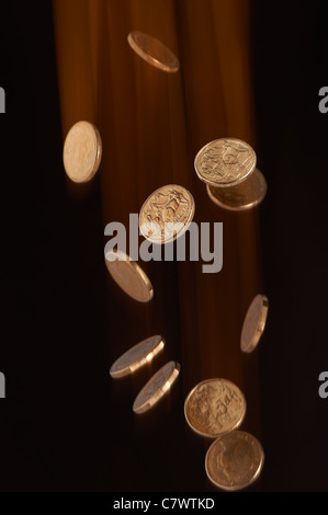 Australian dollar coins falling Banque D'Images