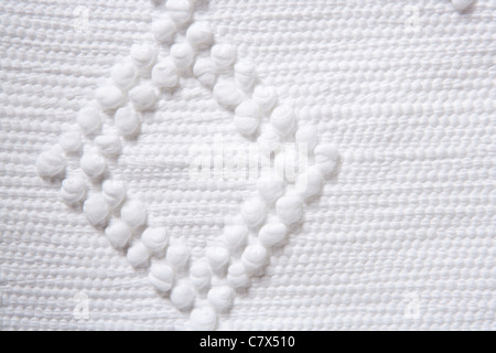 Tricot coton piqué tissu blanc fond texture macro Banque D'Images