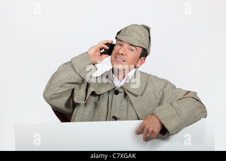 Homme habillé comme Sherlock Holmes Banque D'Images