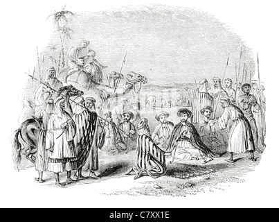 Les bédouins et les voyageurs pour un esclave de négociation du commerce de l'esclavage humain traite du trafic de personnes commerce caravane de chameaux tribu du désert Banque D'Images