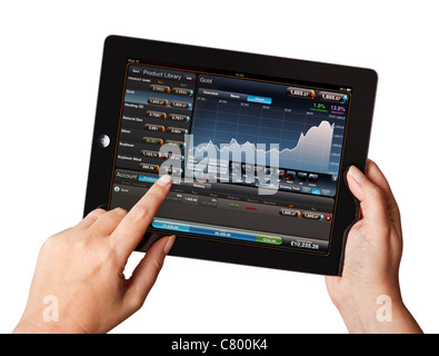 Stock Market trading - Hands holding iPad à l'aide d'une demande de bourse Banque D'Images