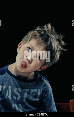 Close up of boy making a face Banque D'Images