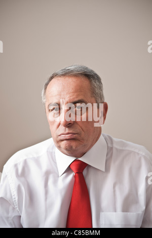 Portrait of Man Making Faces Banque D'Images