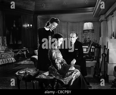 JOAN MILLER, JEAN SIMMONS, Cecil Parker, LA FEMME DANS LE HALL, 1947 Banque D'Images
