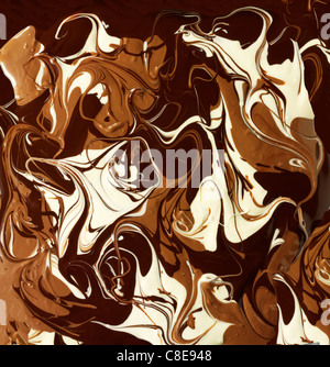 Lisse, lait et chocolat blanc swirls Banque D'Images