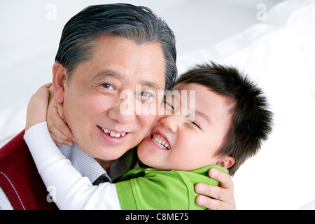 Faire place au petit-fils grand-père chinois Banque D'Images