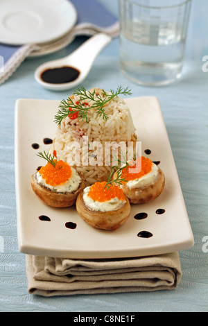 Le riz et les champignons farcis. Recette disponible. Banque D'Images