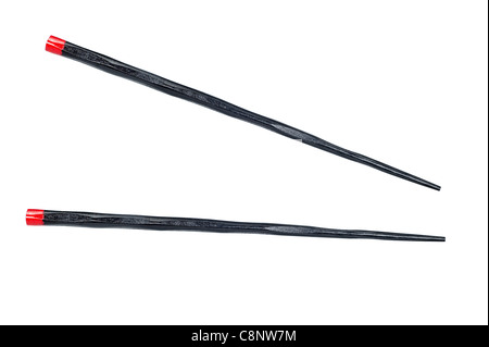 Une paire de baguettes en bois isolé sur blanc. Banque D'Images
