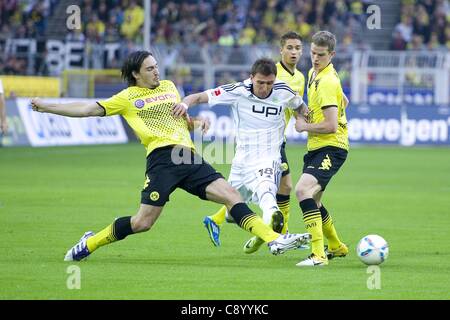 0511 2011 Allemagne Bundesliga. Contre Borussia Dortmund VfL Wolfsburg. Mats Hummels laissée Moritz Leitner et Sven Bender tous contre Mario Mandzukic WOB Banque D'Images