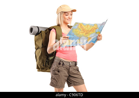 Female hiker looking at map Banque D'Images