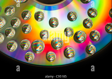 Couleurs arc-en-bulle sur fond de disque Banque D'Images