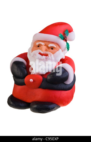 Amusant le père Noël fait de glaçage fondant. Décor pour un gâteau de Noël. Banque D'Images