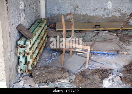 Dans la chambre de vandalisme Palais abandonné de la Culture - Energetik - Place Lénine, Pripyat zone d'exclusion de Tchernobyl l'Ukraine Banque D'Images