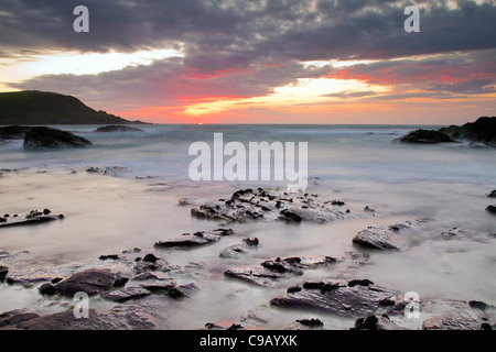Trebetherick Point ; coucher du soleil ; Daymer Bay ; looking towards Brea Hill, Cornwall, UK Banque D'Images