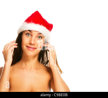 Young woman wearing Santa hat faire drôle de visage sur fond blanc Banque D'Images