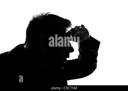 Portrait d'un homme à la silhouette geste avant en studio isolé sur fond blanc Banque D'Images