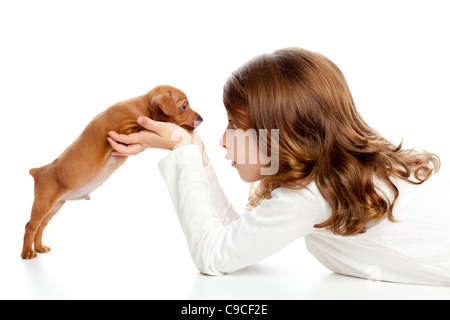 Profil de Brunette girl with dog puppy mascot mini pinscher sur fond blanc Banque D'Images