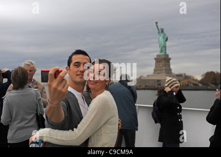 Photo touristique de la Statue de la liberté à partir d'un voyage en bateau Manhattan New York NYC USA Amérique latine Banque D'Images