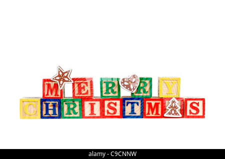 Joyeux Noël à l'enfant d'imprimerie colorés isolé sur fond blanc. Banque D'Images