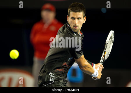 Le 23 janvier 2012 - Melbourne, Victoria, Australie - Novak Djokovic (SRB) en action contre Lleyton Hewitt (AUS) au cours d'un 4ème cycle masculin match le huitième jour de l'Open d'Australie 2012 à Melbourne, Australie. (Crédit Image : © Sydney/faible/ZUMAPRESS.com) Southcreek Banque D'Images