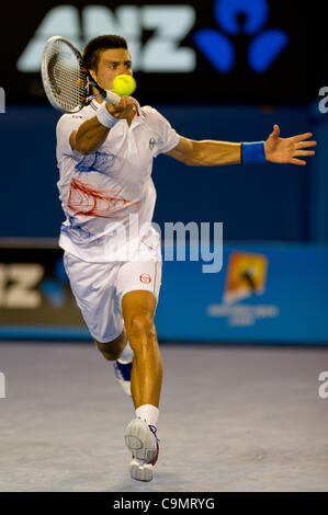 27 janvier 2012 - Melbourne, Victoria, Australie - Novak Djokovic (SRB) en action contre Andy Murray (GBR) au cours d'une demi-finale hommes match le jour 12 de l'Open d'Australie 2012 à Melbourne, Australie. (Crédit Image : © Sydney/faible/ZUMAPRESS.com) Southcreek Banque D'Images