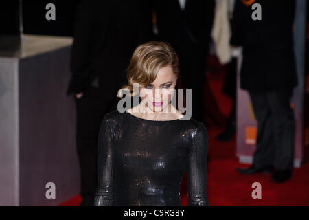 London, UK, 12/02/2012. L'actrice australienne Melissa George, arrivant sur le tapis rouge pour assister à la BAFTAs 2012 Banque D'Images