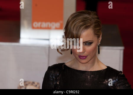 London, UK, 12/02/2012. L'actrice australienne Melissa George, arrivant sur le tapis rouge pour assister à la BAFTAs 2012 Banque D'Images