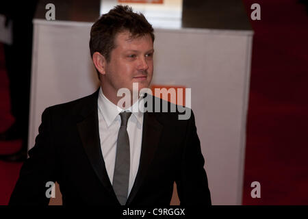 London, UK, 12/02/2012. Acteur, Beau Willimon, arrive au BAFTAs 2012 Banque D'Images