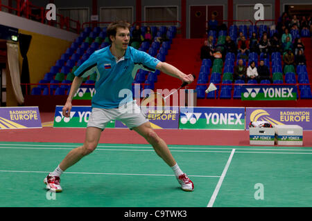 AMSTERDAM, Pays-Bas, 19/02/2012. Joueur de badminton Ivan Sozonov (photo), la Russie perd son match contre Carl Baxter (Angleterre) dans le match pour la médaille de bronze de l'équipe de Badminton Championnats de 2012 à Amsterdam. Banque D'Images