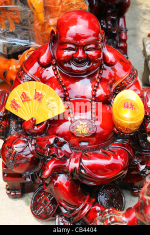 Ornement Bouddha chinois en vente sur la Thaïlande, Laos frontière. Banque D'Images