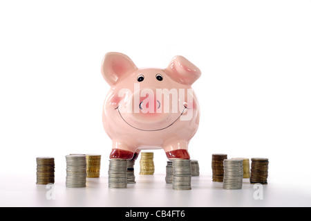 Pink Piggy Banks Comité permanent sur les pièces Banque D'Images